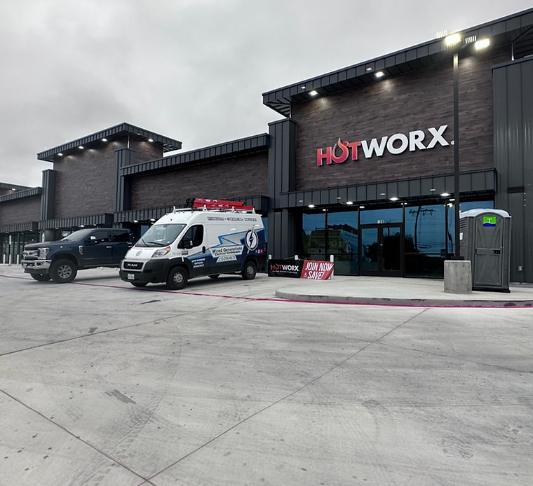 HOTWORX fitness studio with Wired Generations service van on site